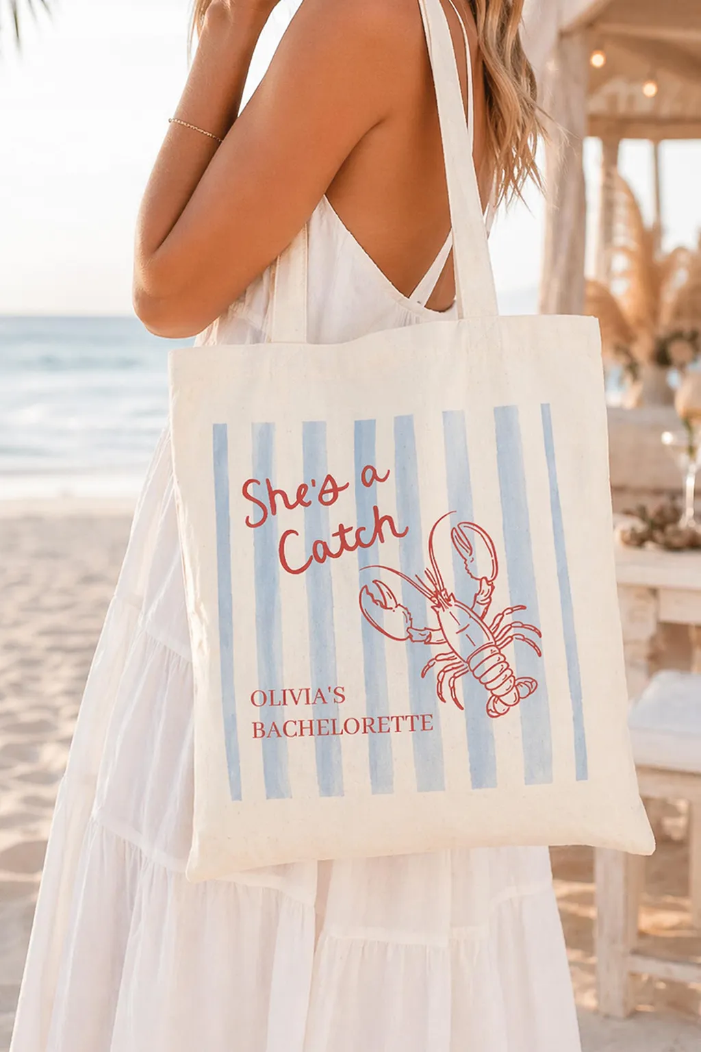 She's a Catch bachelorette welcome bag — a striped lobster tote filled with weekend essentials